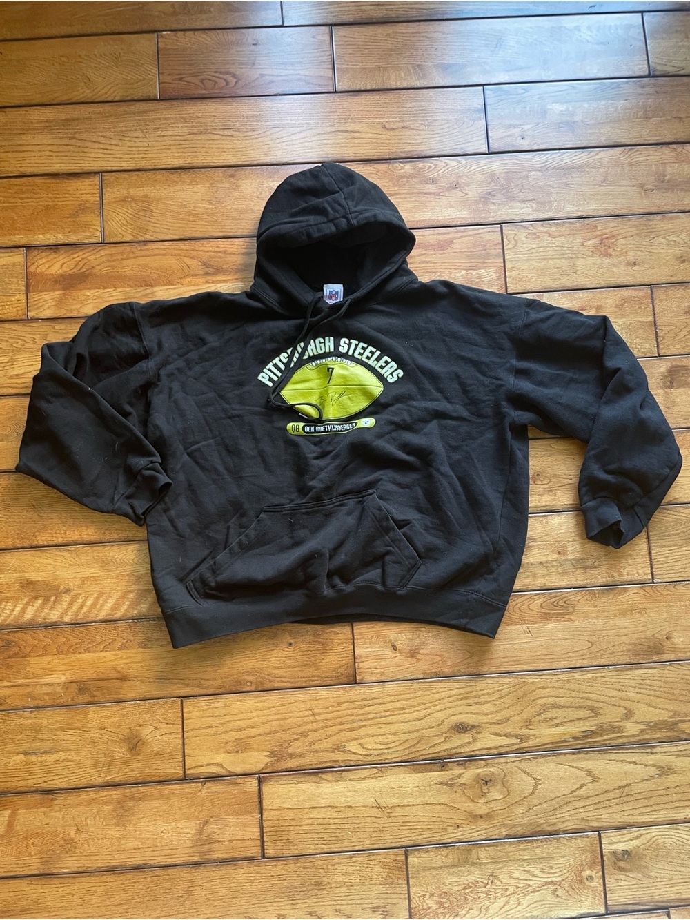 NFL Black Hooded Sweatshirt with Yellow Football Graphic